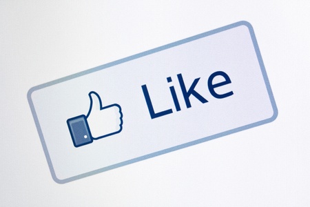 Kiev, Ukraine - December 8, 2011: Closeup shot of Facebook "like button" on a monitor screen. One of the most popular forms of internet communication between users at this time.のeditorial素材