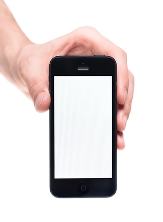 Kiev, Ukraine - January 31, 2013 - Man hand holding new black Apple iPhone 5 with blank screen. The new smartphone is sixth generation version of the iPhone is slimmer and lighter model with new high-resolution, 4-inch screen display.のeditorial素材