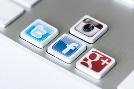 Kiev, Ukraine - May 20, 2013 - A social media icons of Facebook, Twitter, Google Plus and Instagram placed on computer keyboard keys.のeditorial素材