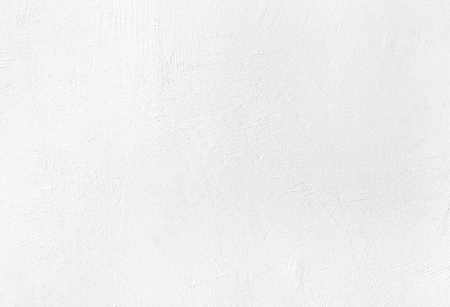 White plaster texture background with grainy detail and reliefの写真素材