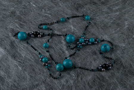 Turquoise  Necklace on Silver Backgroundの写真素材