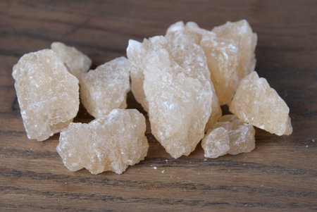 Rock sugar on wooden background