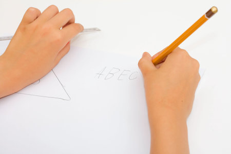 Little girl writing  letters