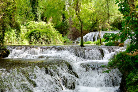 River waterfalls in Monasterio de Piedra, Nuevalos, Zaragoza, Spain during the spring.の写真素材