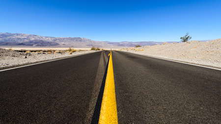 Empty straight road in Death Valley, California, USAの写真素材