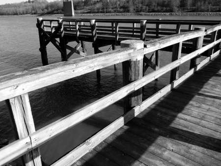 Sitting On the Dock of Riverの写真素材