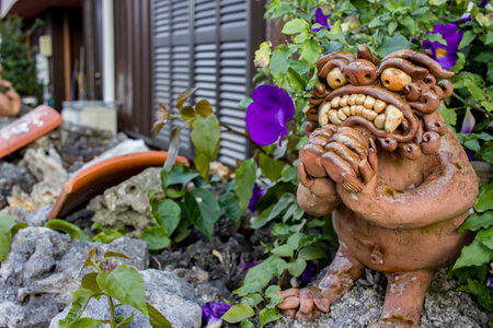 Shisa Statue Sitting Outside Residence.の写真素材