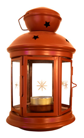 A single red tealight lantern with stars isolated on white backgroundの写真素材