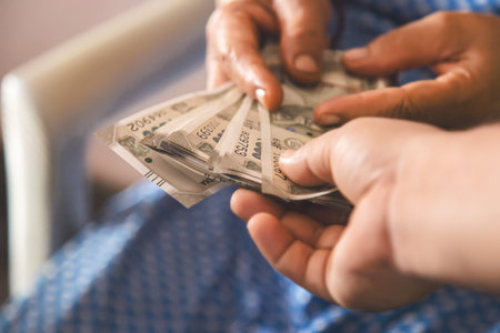 Indian women with 500 rupee paper notes