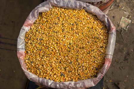 Burlap, Bag full of Split Chickpea Also Know as Chana Dal, Yellow Chana Split Peas, Dried Chickpea Lentils or Toor Dal.の写真素材