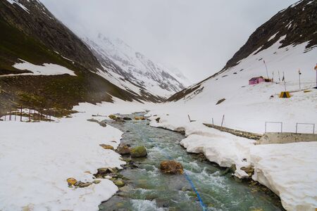Mountain River in High altitude of Ladakh,India. Mountain river flowing through the mountain and valley of Ladakhの写真素材