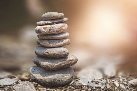 River stones Balanced on the Rock. Pyramid of river stones on of one anotherの写真素材