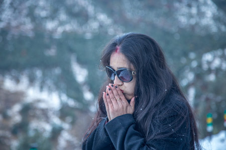 Feeling Cold - Happy Young Woman Feeling Cold Outdoors On A Winter Day