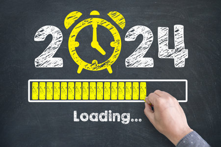Human Hand Drawing New Year Concepts 2024 Countdown Clock on Chalkboard Backgroundの写真素材