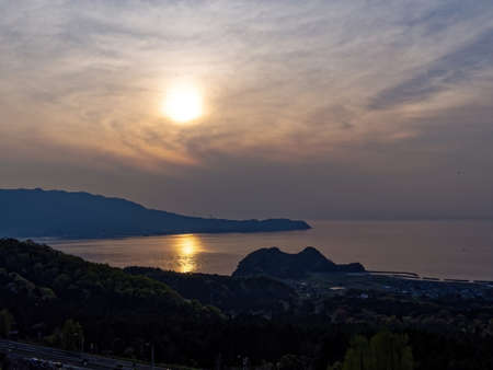 Landscape at dusk from a hillの写真素材
