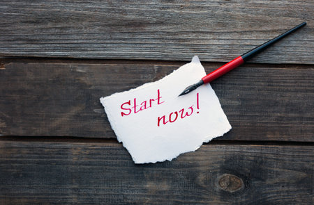 start now hand written on piece of paper