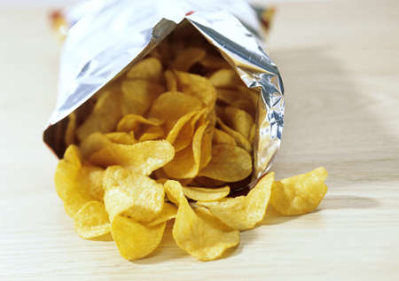 Bag of potato crisps, food, snacks, potato chips, junk foodの写真素材