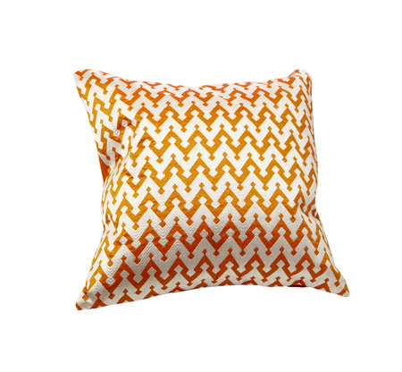 white and orange throw pillowの写真素材