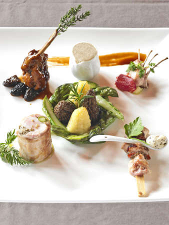 plate of assorted appetizers made of rabbit meatの写真素材