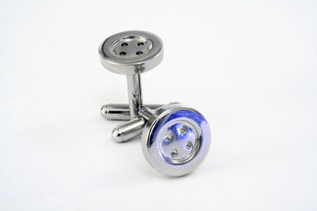 A pair of silver cuff-links