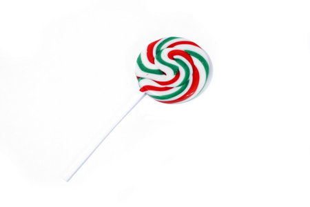One single handmade lollipop on a white background. の写真素材