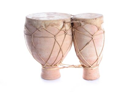Terracotta bongo drums on a white background.の写真素材