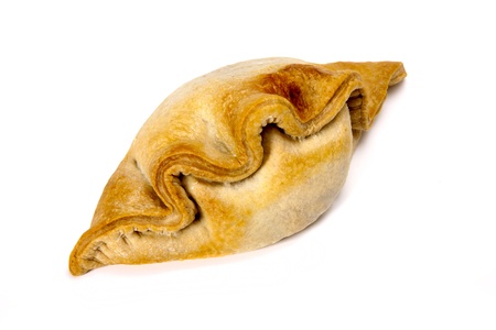 A delusions homemade Cornish pasty on a white background. の写真素材