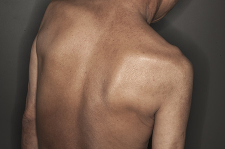 old man show his back body closed upの写真素材