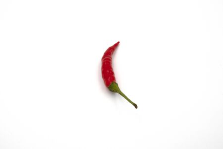 Close up view of fresh small red chili isolated on white backgroundの写真素材