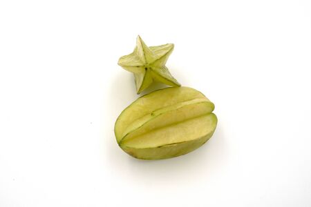 Fresh star fruits isolated on white background. Healthy green fruits. Tropical fruit.の写真素材