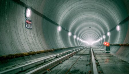 Subway underground tunnel with lightの写真素材