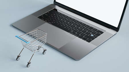 Laptop with small shopping cart isolated on white background. Online shopping concept. 3d render.の写真素材