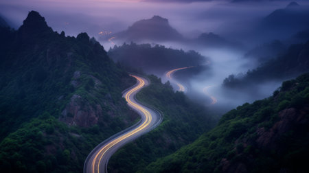 Mountain road in the mist at sunset. Beautiful landscape with a long exposure. Generative AIの素材