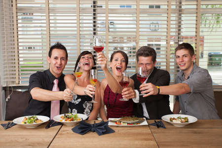 cheers - clink glassesの写真素材