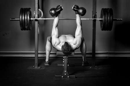 Man doing kettlebell training - crossfitの写真素材