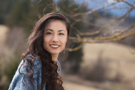 woman outdoor smiling to cameraの写真素材