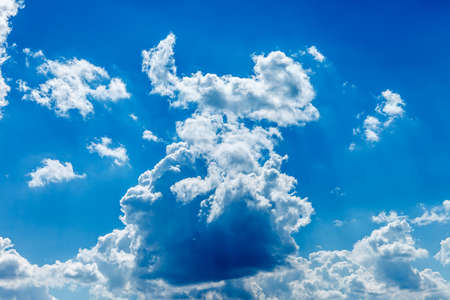 Deep blue sky and cloudsの写真素材
