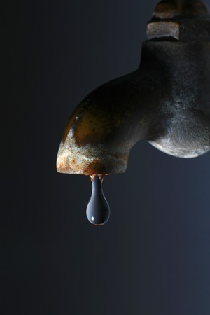 faucet and dropletsの写真素材