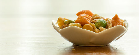 Yummy mixed nuts served in a small plate