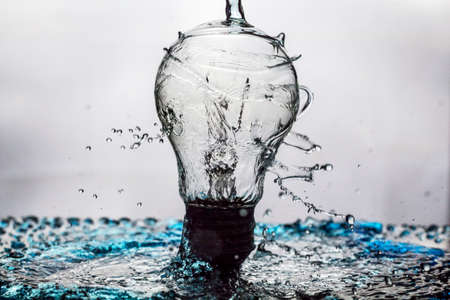 Water swirls lightbulbの写真素材