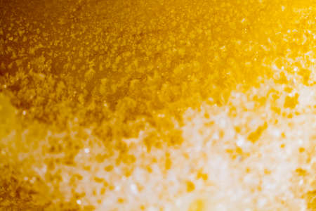 Texture on yellow surfaceの写真素材