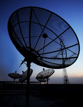 satellite communication disk on evening backgroundの写真素材