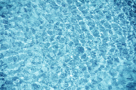 blue water ripple texture of swimming pool