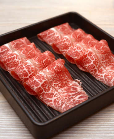raw meat for sukiyakiの写真素材
