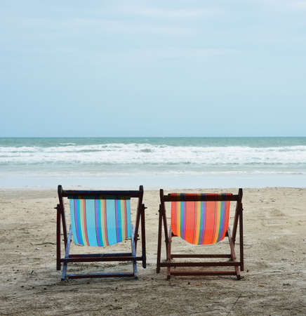 sea, tropical beach chairsの写真素材