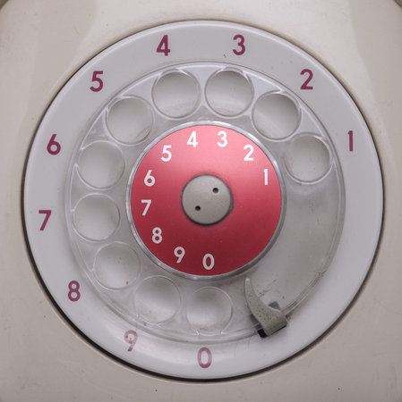 close up of old analog telephone dial