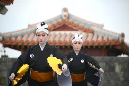 OKINAWA, JAPAN - OCTOBER 26 : Folk dance performing in Okinawa Palace taken October 26, 2013 in Okinawa.のeditorial素材