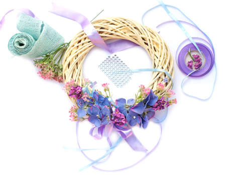 Handmade garland made of flowers and ribbonsの写真素材