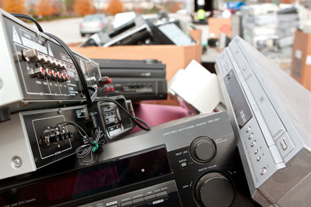 Lawrenceville, GA, USA - November 23, 2013:  Boxes full of discarded stereos and other electronics...