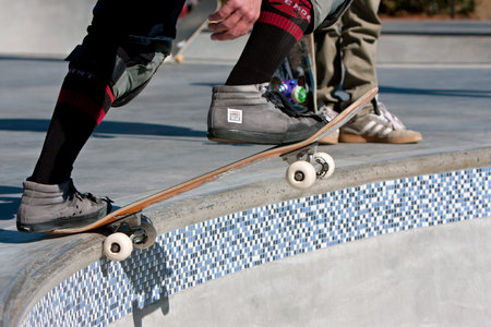 Kennesaw, GA, USA - November 24, 2013:  A veteran skateboarder gets ready to "drop in" during "Old Man Sundays," as part of the grand opening weekend of the brand new Kennesaw Skateboard Park.のeditorial素材